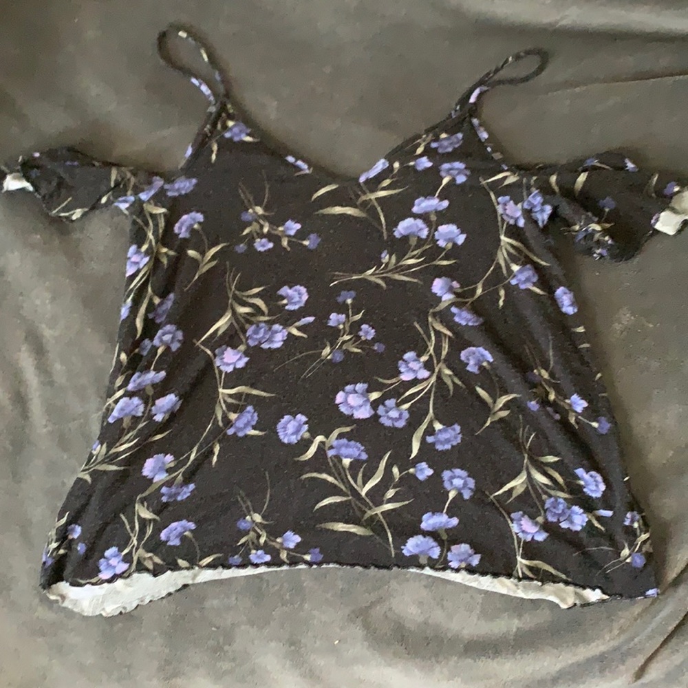 Cute tank top with shoulder detail.